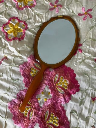 Handheld “M” mirror