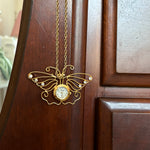 Butterfly clock necklace