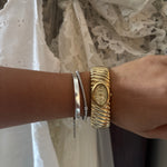 Geneva gold watch cuff