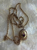 1928 gold tone locket