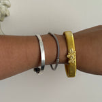 Gold butterfly bangle