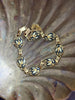 60s floral bird bracelet