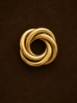 Gold tone brooch