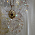 Floral locket necklace